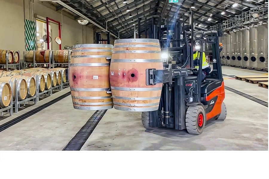 New KAUP Barrel Handler attachment eliminates manual handling of wine barrels 
